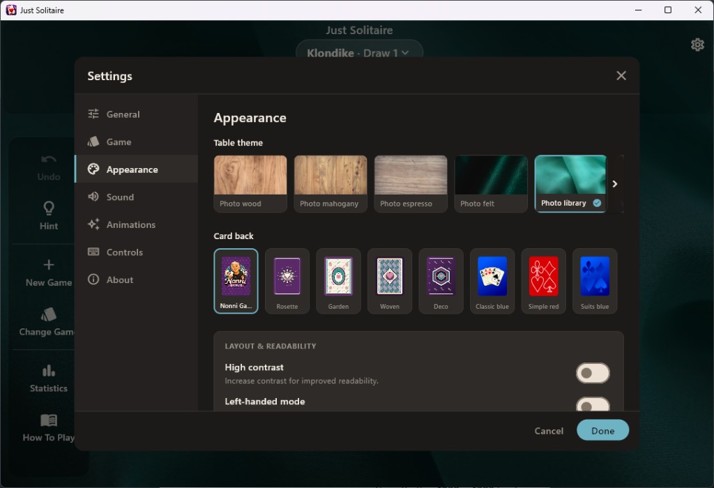 Just Solitaire appearance settings — table themes, card backs, high contrast, and left-handed layout
